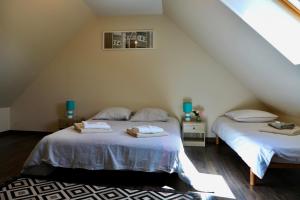 Maisons de vacances House between Land and Sea : photos des chambres