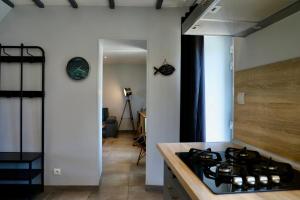 Maisons de vacances House between Land and Sea : photos des chambres