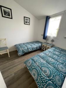 Maisons de vacances Maison DOLUS 4pers dans Residence Privee avec Piscine et SPA : photos des chambres