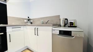 Appartements Futurostudio - 4 saisons Standing - 5min Futuroscope - Parking : photos des chambres