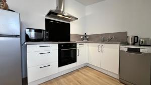 Futurostudio - 4 saisons Standing - 5min Futuroscope - Parking