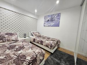 Maisons d'hotes Au Mboa Appartement 2 Chambres au Coeur de Conflans : photos des chambres