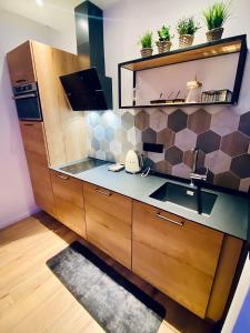 Appartements Saphir Spa - Sauna Balneo Chromotherapie Massage : photos des chambres