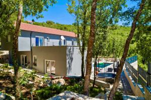 Luxury Villa Andrea Vrzika in forest near the sea