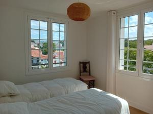 Appartements Spacieux T4 renove a Hendaye, lumineux et calme, proche plage avec parking et WiFi. - FR-1-239-985 : photos des chambres