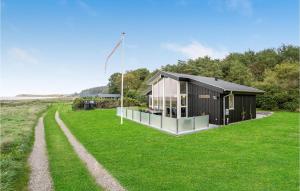 Three-Bedroom Holiday Home In Skals