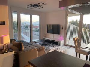 Luxusapartment mit 40 qm Terrasse, E-Parkplatz und Parkplatz