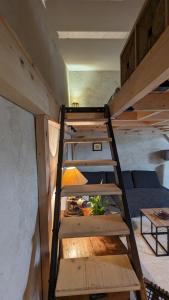 Appartements studio cosy en centre village : photos des chambres