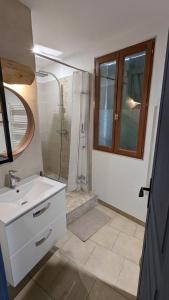 Appartements studio cosy en centre village : photos des chambres
