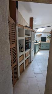 Appartements studio cosy en centre village : photos des chambres