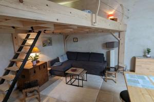 Appartements studio cosy en centre village : photos des chambres