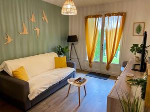 Appartements Appartement avec jardin : photos des chambres