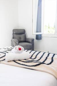 Appartements COSYFAMILY 1er etage Piscine -WIFI- NEUF-FAMILLE -15MIN PLAGE - TOP PROS SERVICESConciergerie : photos des chambres