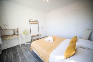 Appartements COSYFAMILY 1er etage Piscine -WIFI- NEUF-FAMILLE -15MIN PLAGE - TOP PROS SERVICESConciergerie : photos des chambres