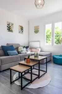 Appartements COSYFAMILY 1er etage Piscine -WIFI- NEUF-FAMILLE -15MIN PLAGE - TOP PROS SERVICESConciergerie : photos des chambres