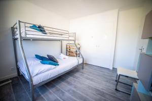 Appartements COSYFAMILY 1er etage Piscine -WIFI- NEUF-FAMILLE -15MIN PLAGE - TOP PROS SERVICESConciergerie : photos des chambres
