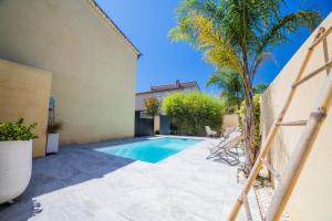 Appartements COSYFAMILY 1er etage Piscine -WIFI- NEUF-FAMILLE -15MIN PLAGE - TOP PROS SERVICESConciergerie : photos des chambres
