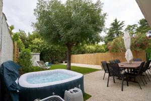 Maisons de vacances Maison familiale avec jacuzzi, quartier calme : photos des chambres