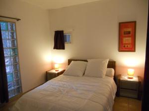 Appartements appartement independant avec jardin : photos des chambres