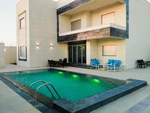 Airport chalet amman - Al Qasţal