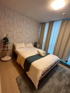 BGC One Uptown Suite by Christine Suites PH