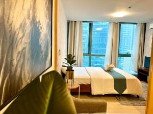 BGC One Uptown Suite by Christine Suites PH