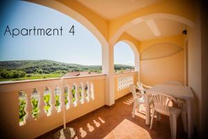Apartment in Lopar with sea view, loggia, air conditioning, W-LAN (186-4)