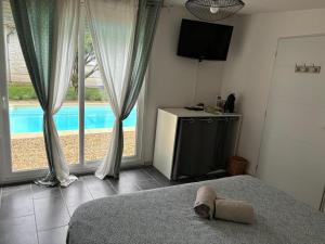 Sejours chez l'habitant Echappee Mistral - Detente Jacuzzi prive & Brasero : photos des chambres