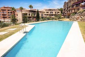 Amplio apartamento con piscina en Mijas