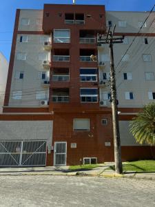 APARTAMENTO ACONCHEGANTE - Na PRAIA GRANDE