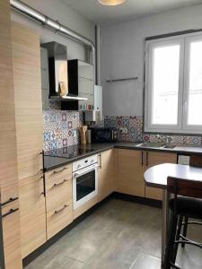 Appartements Coeur de ville, balcon & parking gratuit : photos des chambres