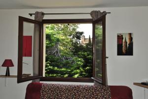 Maisons de vacances Des Chateaux entre les Feuilles - Parc vue Village : photos des chambres