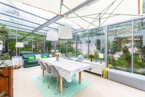 Maisons de vacances GuestReady - Charming haven with a private garden : photos des chambres