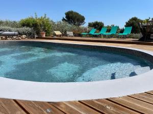 Maisons de vacances Maison chaleureuse avec piscine : photos des chambres