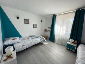Maisons de vacances Maison chaleureuse avec piscine : photos des chambres