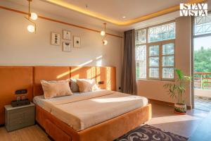 Gangas Jewel - Breakfast Included at Rishikesh by StayVista