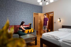 Three-Bedroom Apartment room in Penzion Onyx
