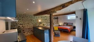 Appartements Les gites de La Petite Taupe - Studio Jo : photos des chambres