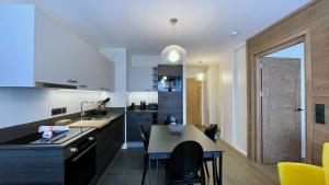 Appartements Homency - Residence Fermes de l'Alpe A003 : photos des chambres