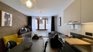 Appartements Homency - Residence Fermes de l'Alpe A003 : photos des chambres