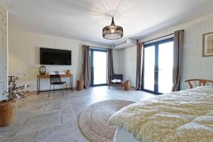 Villas Un joli hameau au coeur du vignoble de l'Escarelle et de la Provence Verte : photos des chambres