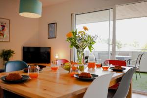 Appartements Appartement lumineux proche lac : photos des chambres