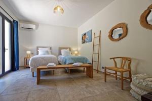 Villas Un joli hameau au coeur du vignoble de l'Escarelle et de la Provence Verte : photos des chambres