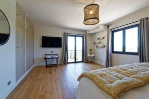 Villas Un joli hameau au coeur du vignoble de l'Escarelle et de la Provence Verte : photos des chambres