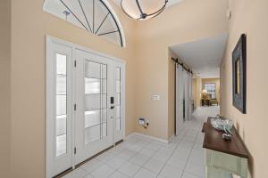 Surfside Beach House - Gorgeous Canal Front Home - Heated Pool & Boat Dock