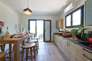 Villas Un joli hameau au coeur du vignoble de l'Escarelle et de la Provence Verte : photos des chambres