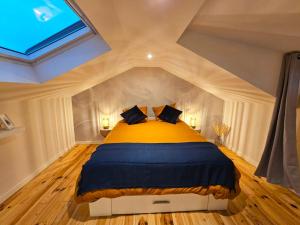Appartements Sous les toits dans les nuages : photos des chambres