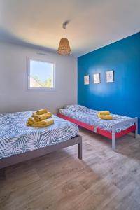 Maisons de vacances Charmante maison moderne a deux pas de la mer ! : photos des chambres