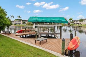 Pristine Waterfront Villa in Cape Coral with Lagoon Style Pool Spa and Boat Lift