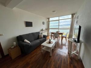 Piso primera línea de playa y vistas al mar en Cariño